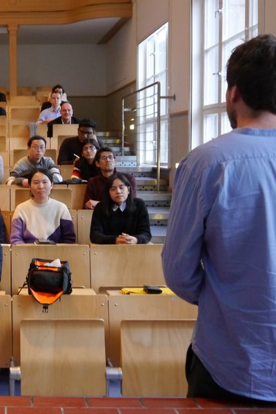 Student presenting his PhD work plan at the annual EC2/BIG-NSE workshop in January 2019 - Copyrights: J.P. Lonjaret